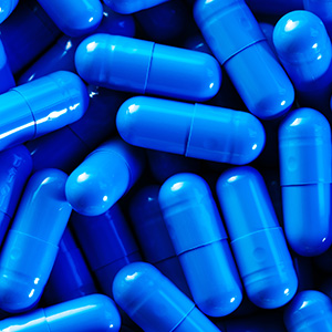 Close up of blue capsules