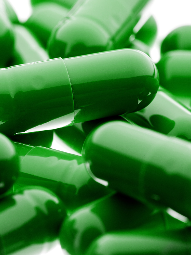 Close up of green capsules