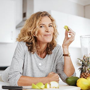 Woman with blonde hair eating healthy