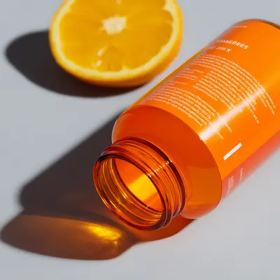 picture of a pill bottle with a pressure sensitive supplement label